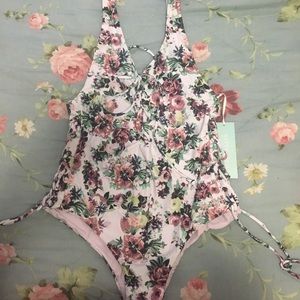 Kittenish one piece